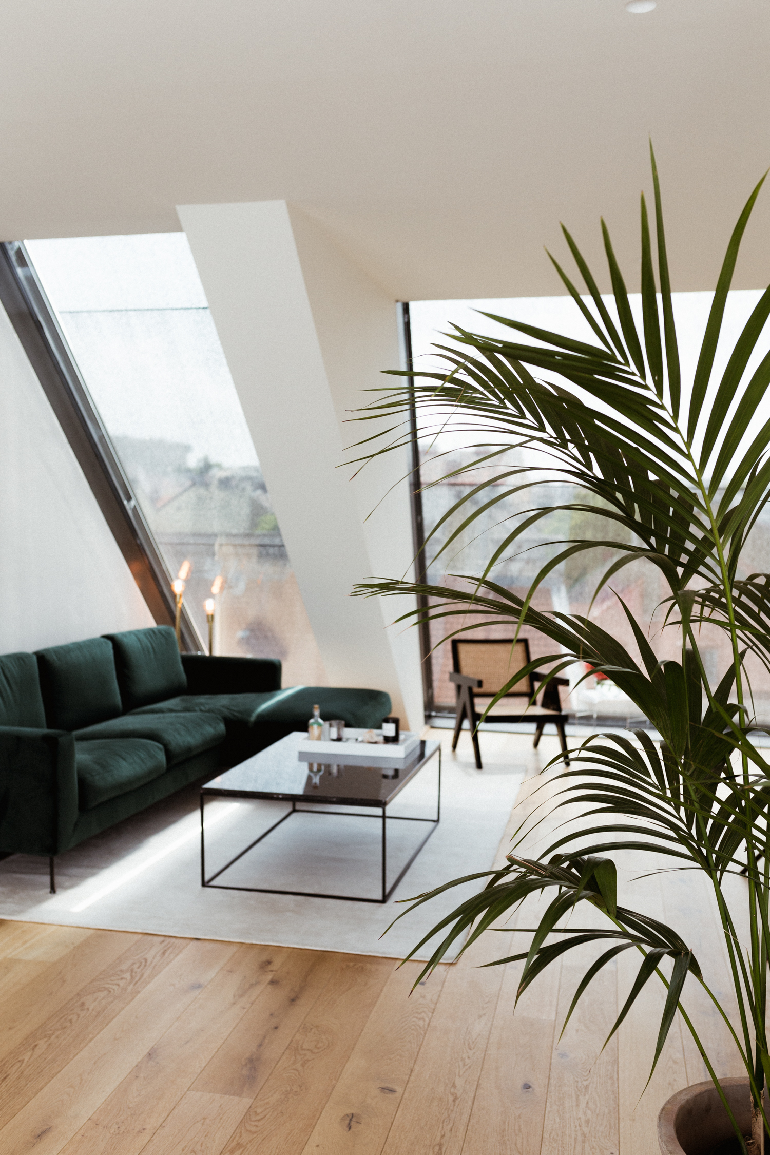 Vicky Heiler Apartment, Living Room: Green Velvet Sofa - Bikinis & Passports