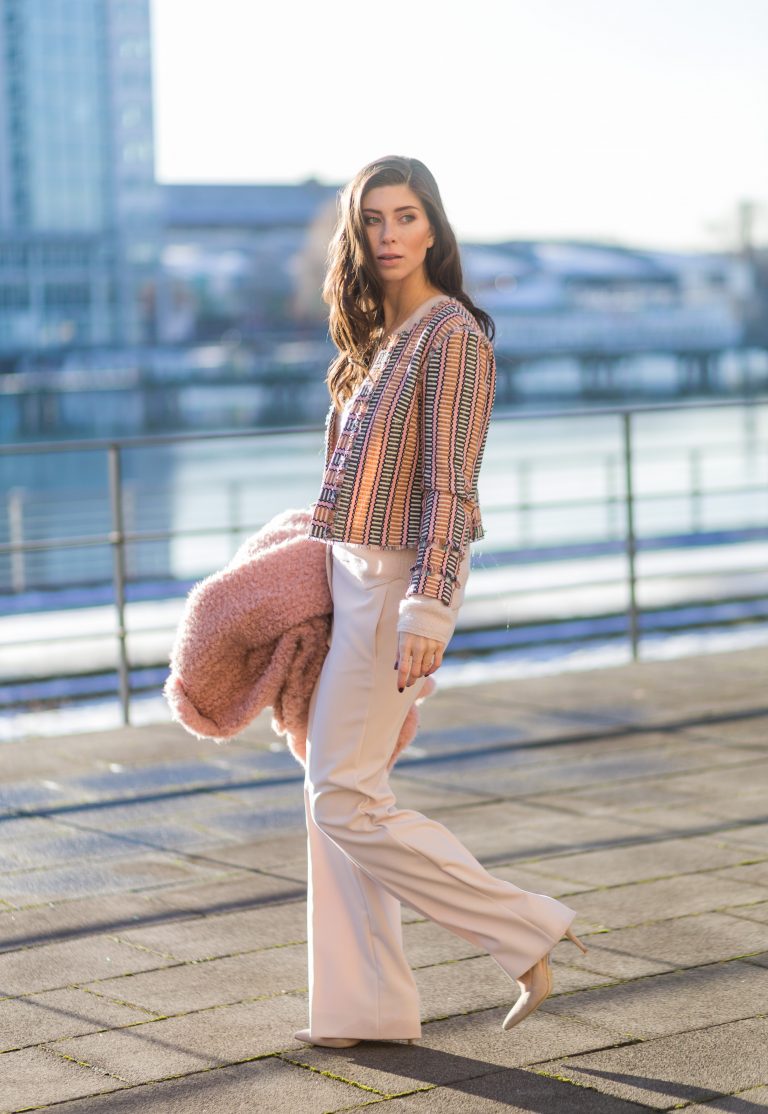 BERLIN, GERMANY - JANUARY 17: Vicky Heiler wearing a pink teddy coat Marc Cain, white creme Marc Cain wide leg pants, knit during the Mercedes-Benz Fashion Week Berlin A/W 2017 on January 17, 2017 in Berlin, Germany. (Photo by Christian Vierig/Getty Images) *** Local Caption *** Vicky Heiler