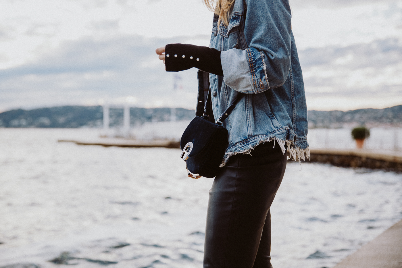 Won Hundred Oversize Distressed Denim Jacket: Won Hundred Dina is a denim jacket with a "boyfriend" fit and a faded wash. | Bikinis & Passports