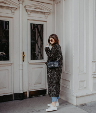 Outfit: long leo coat + Dior sneakers | Bikinis & Passports