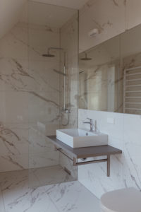 White Marble Bathroom | Bikinis & Passports