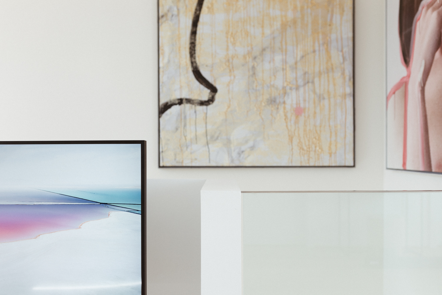 Vicky Heiler Apartment, Living Room: Samsung The Frame TV 55 inch - Bikinis & Passports