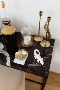 Vicky Heiler Apartment, Living Room: Black Marble House Bar - Bikinis & Passports